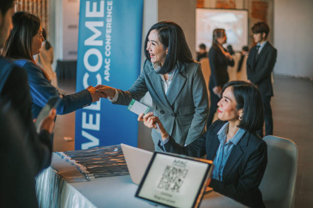 Registration desk welcoming delegates